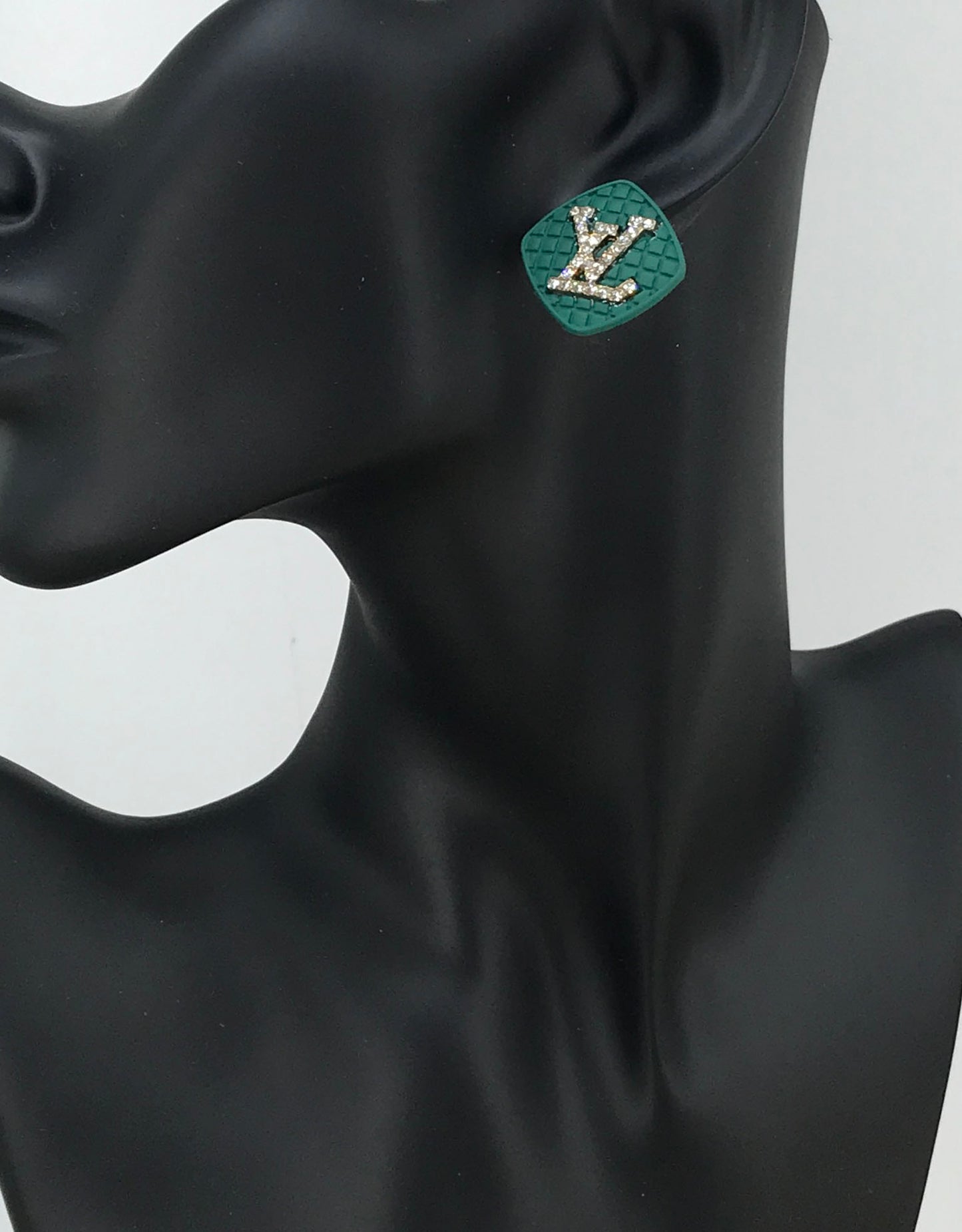Emerald Spark Logo Stud Earrings
